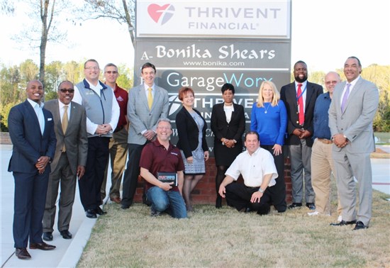 Standing from left: Lawrence Williams, owner, Gravity Indoor Trampoline Park; Melvin Everson, director of Business and Industry Training, Continuing Education, Gwinnett Technical College; Jeff Tweed, owner, Big Frog Custom T-Shirts and More of Snellville; Eric Van Otteren Snellville Economic Development Manager; Councilman Dave Emanuel; Barbara McClure, founder and chief executive officer of Snellville-based A Defined Image Med Spa; Karen Foote, owner, L.E.A.A.D.S; Debra Poirot, District director, Congressman Rob Woodall's office; Christopher Blocker, business services specialist, WorkSource Atlanta Regional Commission; Doug Adams, president Greater Eastside Chamber of Commerce and Adams Financial Management owner; and Bruce LeVell, Small Business Association's Office of Advocacy's Region 4 advocate. Kneeling from left: Edward MacFarlane, owner FastSigns, and Joe Wilson, political activist.